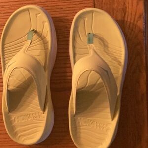 Hoka One One Cream and Yellow Mules for Casual Comfort